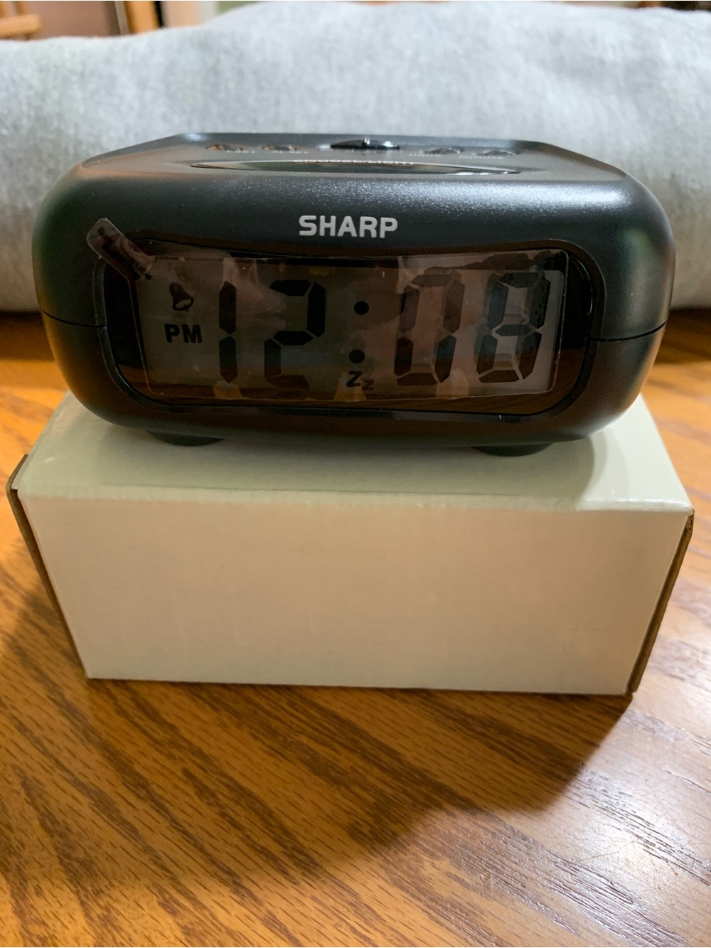 Vintage Sharp battery powered alarm clock.
